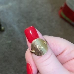 Hammered engraved gold ring.